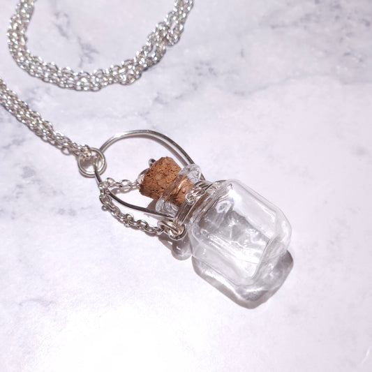 Silver chain spell bottle pendant with clear glass vial, cork stopper, wire wrap