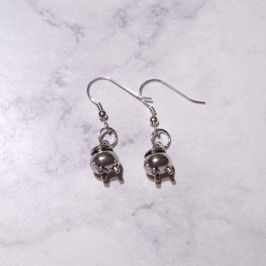 Silver skull charm drop earrings with fishhook closures